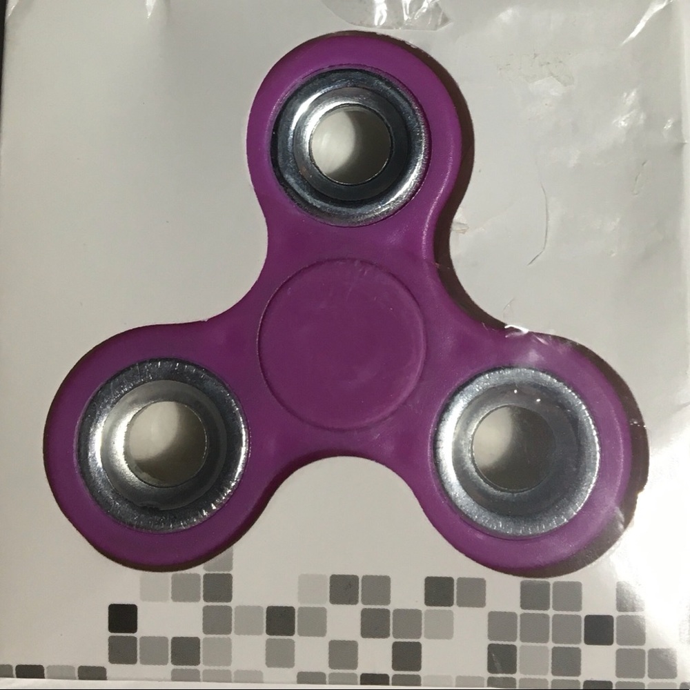 Item# 304. New purple fidget spinner.